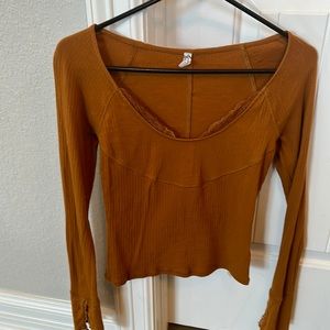Like new rust colored free people layering top